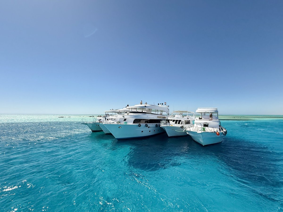 Tourist yachts moored near White Island in Ras Mohammed marine reserve, Sharm El Sheikh, Egypt.